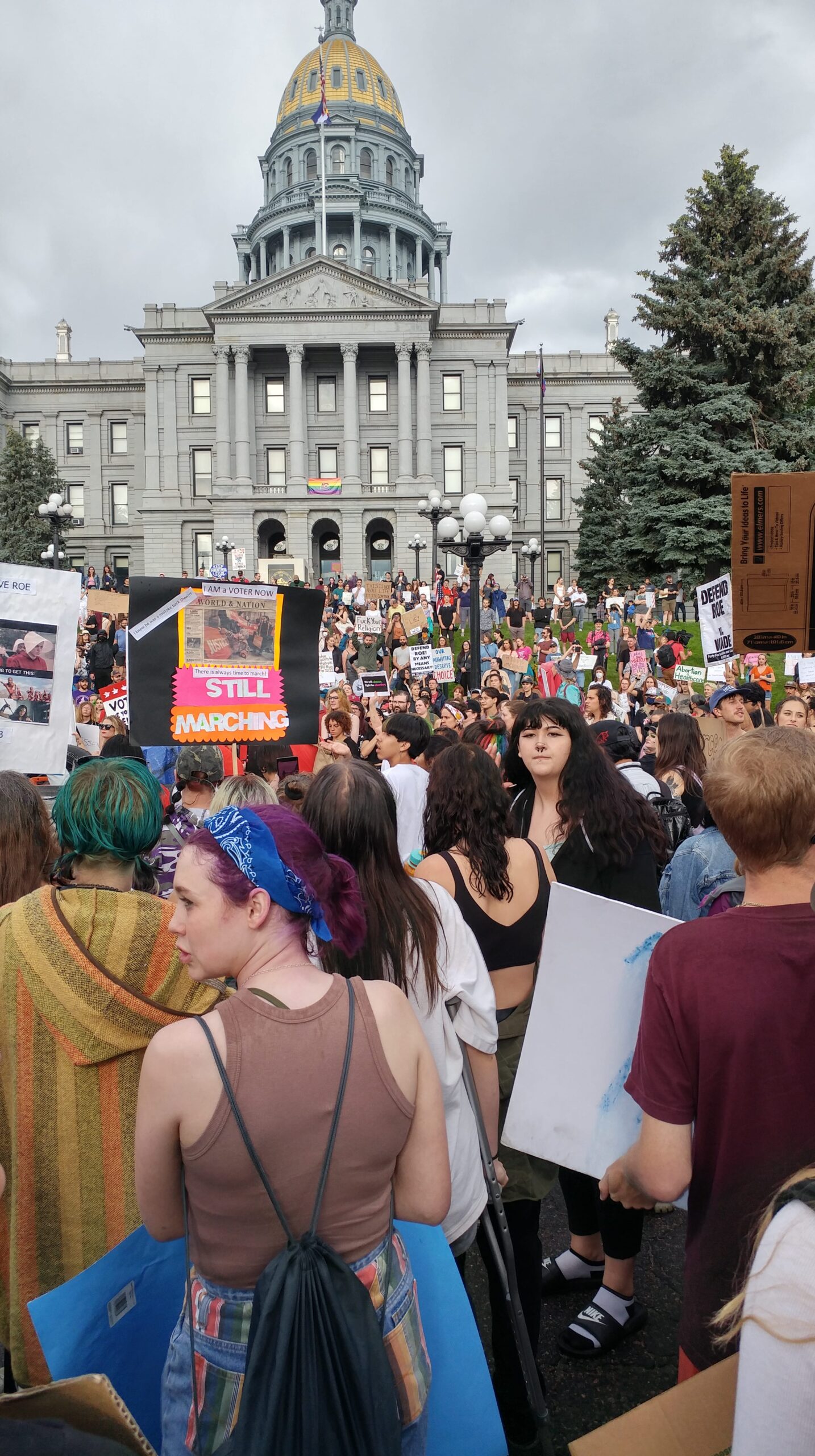 crowd gathered at base of colorado capitol
