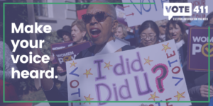 women marching holding signs about voting
