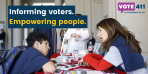 woman explaining voting to student