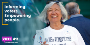 woman smiling informing voters empowering people